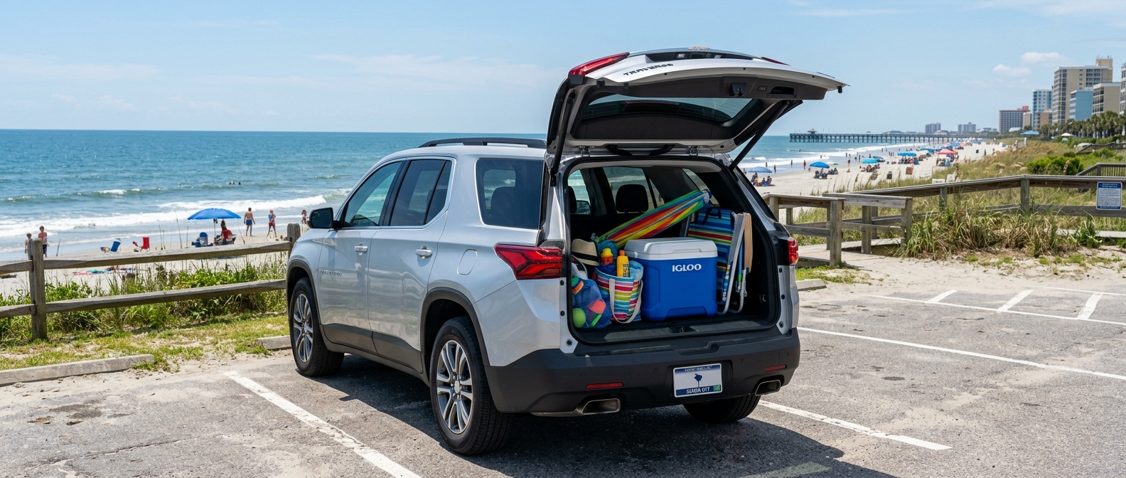 2026 Chevrolet Traverse with liftgate open near Garden City Beach pier parking area, South Carolina